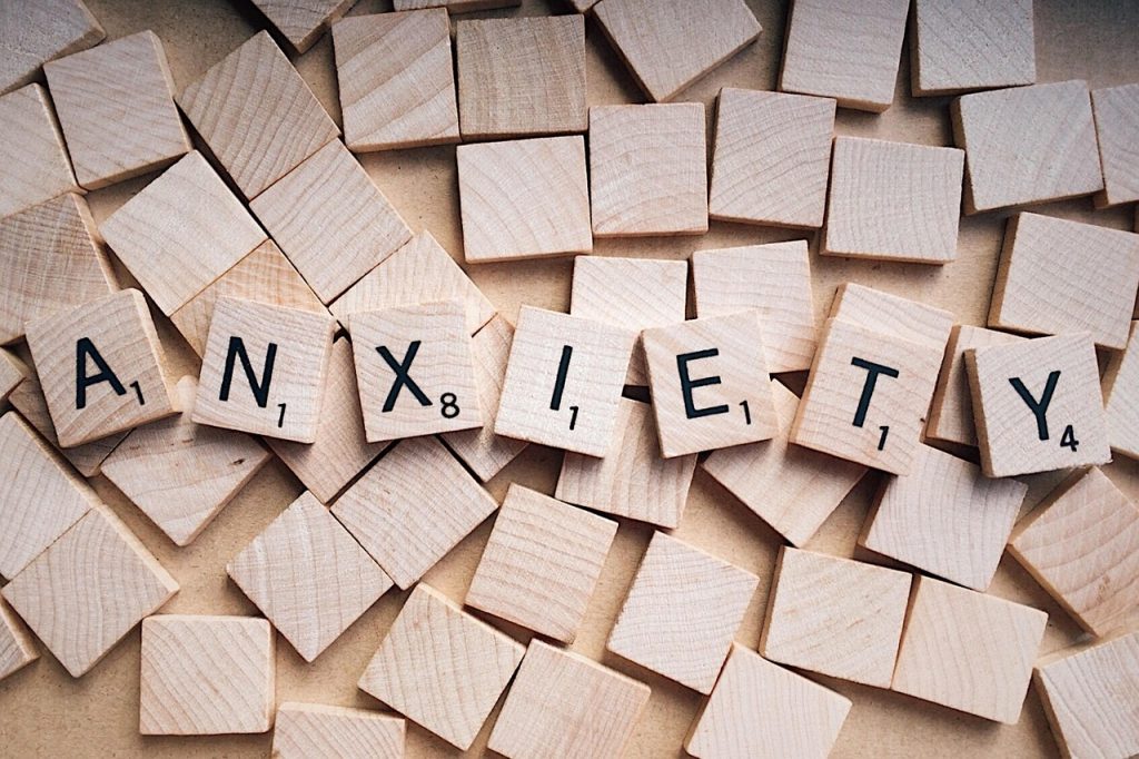 The word ANXIETY spelled on Scrabble tiles